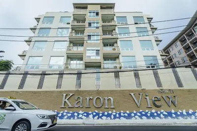 a car parked in front of a building at Karon View 2 Bed 5 Minutes walk to Karon Beach 11 in Karon Beach