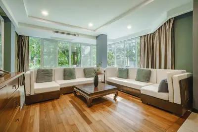 a living room with a couch and a table at Karon View 2 Bed 5 Minutes walk to Karon Beach 11 in Karon Beach