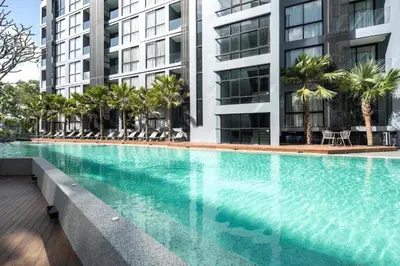 a large swimming pool in front of a building at Tropics Kamala Hill View Suite CTG L605, near Kamala Beach and Fantasea in Kamala Beach