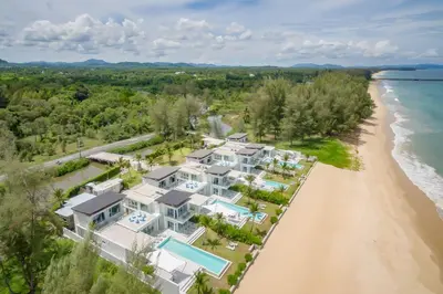 an aerial view of a large house on the beach at Baan Kloi III in Ban Na Tai