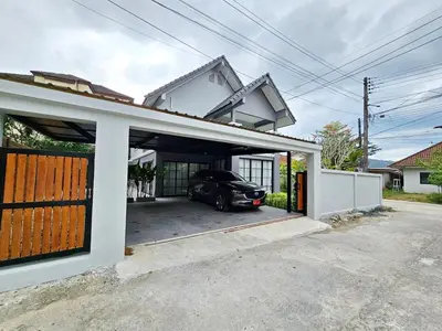 a car parked inside of a house with a garage at 2 Bedroom Pool Villa in Kamala in Kamala Beach