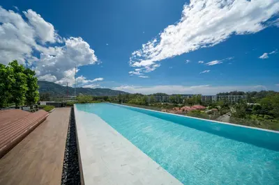 a large swimming pool with a blue sky at Skypark Laguna Bang Tao Beach in Laguna Phuket
