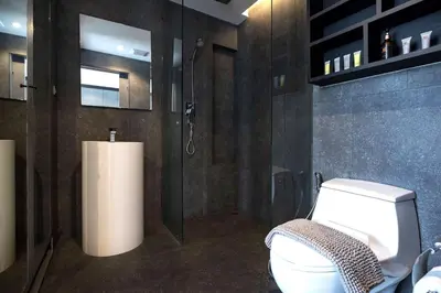 a bathroom with a toilet and a shower at Fun, Beach & Topical Vibes! Pool View 2BR Apartment CTG P603-4 in Tropics Kamala Residence in Kamala Beach