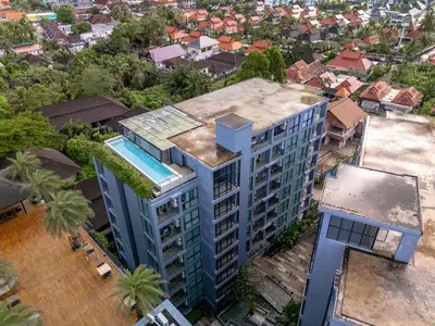 an overhead view of an apartment building with a swimming pool at Luxury 1BR Resort Retreat by IBG Property P514 in Kamala Beach