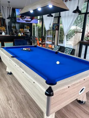 a pool table in the middle of a room at Kalamung Resort and Pool villas in Ao Nang Beach