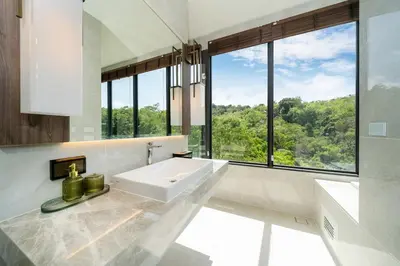 a white bathroom with a sink and large windows at The Exclusive Sky D2 \u8c6a\u534e4\u5367\u5ba4\u6d77\u666f\u522b\u5885 \u79c1\u4eba12m\u65e0\u8fb9\u6d77\u666f\u6cf3\u6c60 \u6bcf\u65e5\u6e05\u6d01 in Kamala Beach