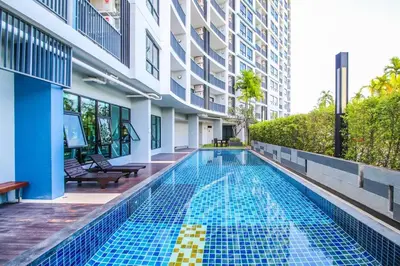 a swimming pool in the middle of a building at Vista Phuket Old Town Gym Pool Wifi Netflix Walk to All in Phuket Town