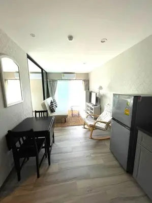 a kitchen and living room with a table and a refrigerator at С12 Title Naiyang Ватсап669З5В2I976 in Nai Yang Beach
