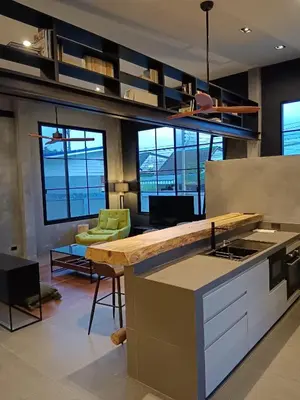 a kitchen with a counter top and some windows at New 2 BR Villa Nai Thon in Nai Yang Beach