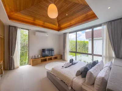 a bedroom with a large bed and a large window at Luxurious 3-Bedroom Villa with Private Pool Lux Pride 4 L10 Phuket in Bang Tao Beach