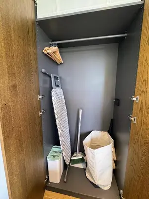 a closet with a door open with a trash can at Laguna Beachside Residences by Beringela in Bang Tao Beach