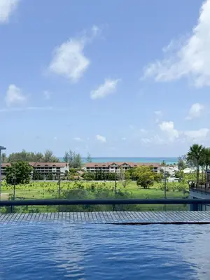 a view of the water from a swimming pool at Amazing 1Bdr Kamala City Gate 3 Pools, Coworking in Kamala Beach