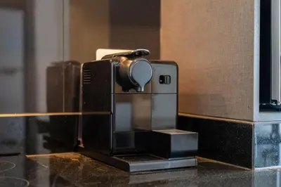 a coffee maker sitting on top of a counter at Holiday apartment at The Deck by Lofty in Patong Beach