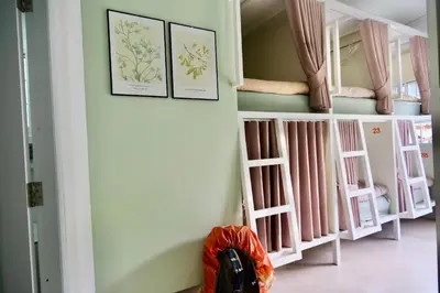 a room with a bunch of bunk beds at Sweed Dee Love Hostel in Phi Phi Don
