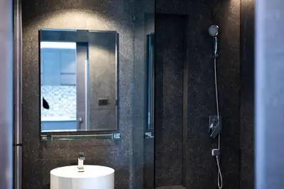 a bathroom with a sink and a mirror at Tropical Kamala Pool View 1 BR CTG B206 in Kamala Beach