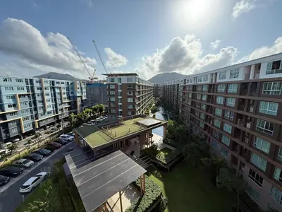 an overhead view of a building with a tennis court at Dcondo Creek Phuket 2BR in Kathu
