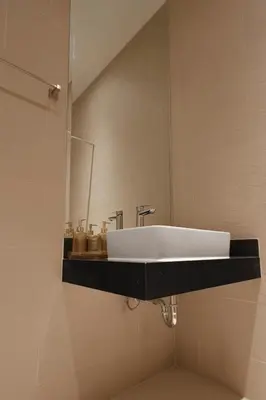 a bathroom with a sink and a mirror at Tantawan house - Kamala beach in Kamala Beach