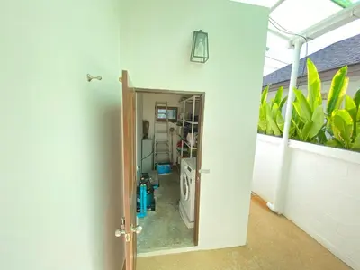 a room with a mirror on the side of a house at Villa Jasmine in Rawai Beach