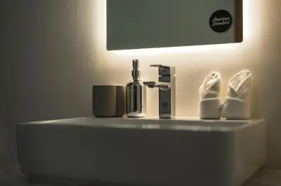 a bathroom sink with a bottle of soap and socks at V162 Super Modern Brand New Stunning Design in Rawai Beach