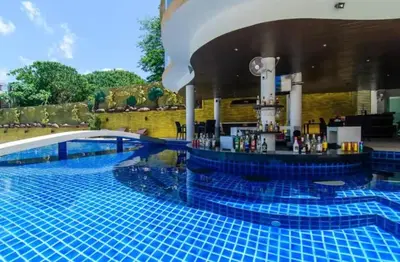 a pool at a hotel with blue tiles on it at C229 1BR Studio Sea View 850m to Beach Gym in Patong Beach