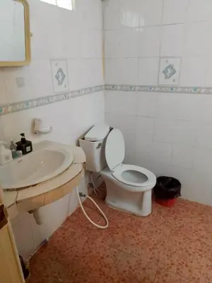 a bathroom with a toilet and a sink at xx GO INN Patong Beach Phuket - โกอินน์ ป่าตอง in Patong Beach