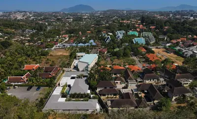 an overhead view of a town with houses and trees at Andaman Paradise 3 - Luxury 4 Bedrooms Pool Villa in Rawai Beach