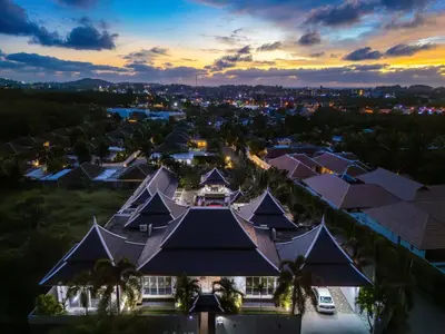 an aerial view of a mansion at dusk at Luxurious 8bedroom villa in Bangtao Large private pool Group vacation villa Free maid and private kitchen service Extended in Bang Tao Beach