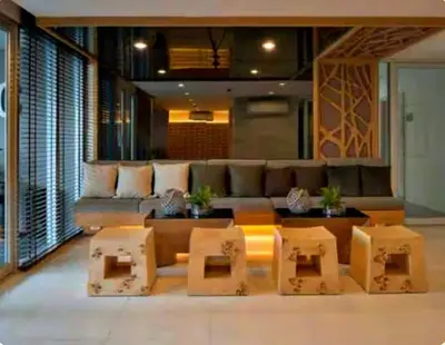 a living room with a couch and some boxes at Luxury Condo Near Patong Beach & Shopping Mall in Kathu