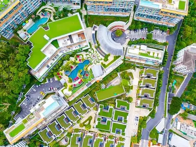 an overhead view of a resort with a swimming pool at Surin Beach Serviced 3 Bedroom Sea View Apart-ment Comprehensive Facilities Resort Pool Gym Guest Choice in Surin Beach