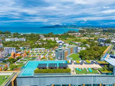 an aerial view of a city and the ocean at Surin Beach Serviced 3 Bedroom Sea View Apart-ment Comprehensive Facilities Resort Pool Gym Guest Choice in Surin Beach