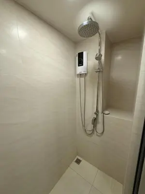 a bathroom with a shower stall with a shower at The Base Rise in Phuket Town
