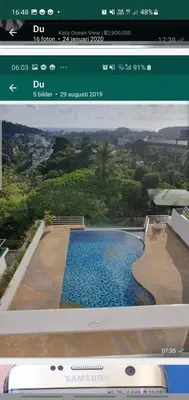 a computer screen showing a picture of a swimming pool at Christian Apartament in Kata Beach
