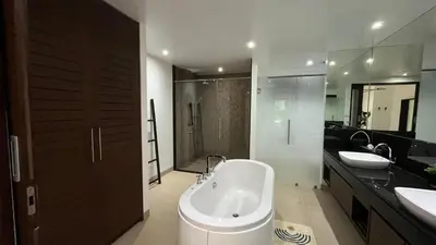a bathroom with a toilet and a sink and a tub at Tranquil 2-Bedroom Getaway - Celeena #870 in Rawai Beach