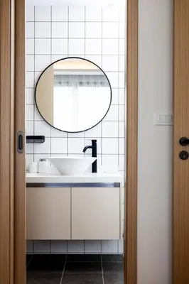 a bathroom with a sink and a mirror at Modern 2BR apartment on Kamala Beach in Kamala Beach
