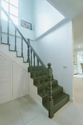 a staircase in a home with white walls and white floors at Koson Elegant 3 Bedroom Villa in Rawai Beach