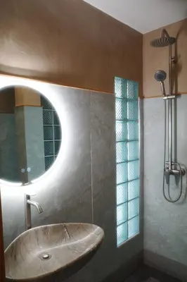 a bathroom with a sink and a mirror at Salty Pearl Phuket 1 in Patong Beach