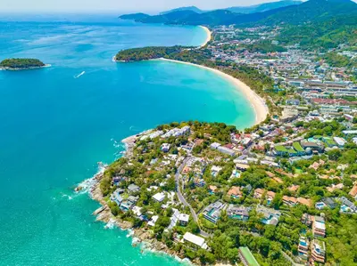 an aerial view of a small island in the ocean at Kata Eden View - 1 BR Beachfront Luxury Apartment in Karon Beach