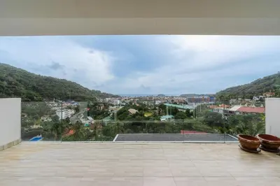 a view of a city from the roof of a house at C236 Best Pool &Sea View 2BR Condo Prime Location in Karon Beach