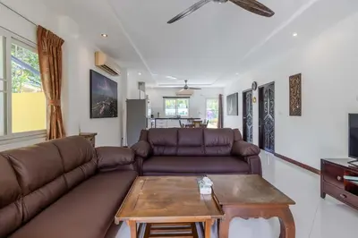 a living room with a couch and a coffee table at V245 3BR with Pool Close to Phuket Best Beaches in Rawai Beach