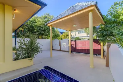 an outdoor patio with a pavilion and a pool at V245 3BR with Pool Close to Phuket Best Beaches in Rawai Beach