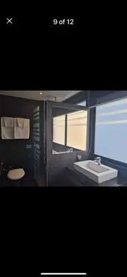 a bathroom with a sink and a toilet at L01 Bangla Suites Modern Studio On Bangla Road in Patong Beach