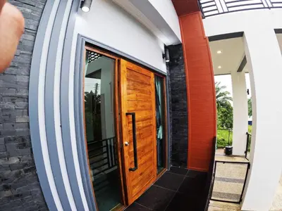 a front door of a house at Krabi Top Sea Hill Villa in Klong Muang Beach