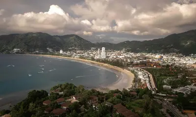 an aerial view of a beach and a city at Spectacular two bed penthouse amazing sea views in Patong Beach
