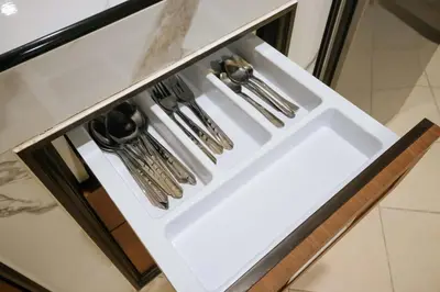 a white drawer in a kitchen with utensils at V247 Poolside 1BR Near Naiharn Beach & Gym in Rawai Beach