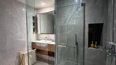 a bathroom with a glass shower and a sink at 3bdr new apartmet in Laguna 50m form beasch LBS-3504 in Bang Tao Beach