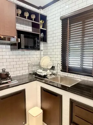a kitchen with a sink and a counter top at PS House Bangtao in Bang Tao Beach