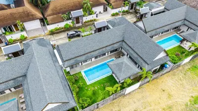 an overhead view of a house with a swimming pool at summer stay pool villa in Ban Na Bon
