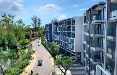 an aerial view of an apartment building at Cassia 1 bedroom in Bang Tao Beach