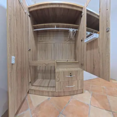 a large wooden shower in a room with wooden floors at Stay 94 Patong in Patong Beach