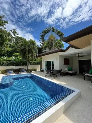 a swimming pool in the backyard of a house at Villa Vie Phuket Rawai 3 Bedrooms in Ban Saiyuan (1)